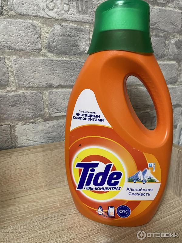 Жидкий стиральный порошок Tide фото