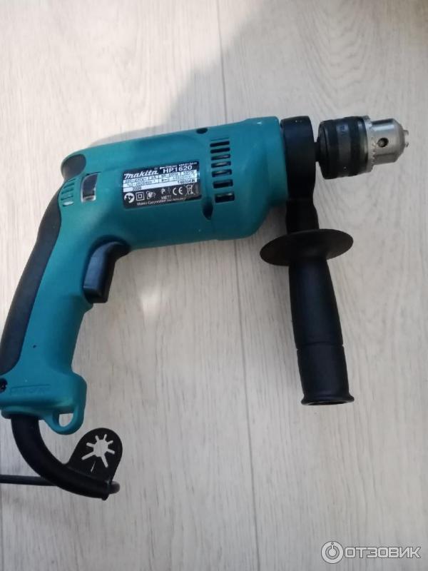 Дрель ударная Makita HP1620 фото