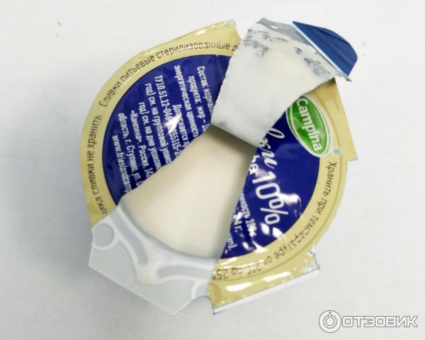 Сливки порционные Campina 10% фото