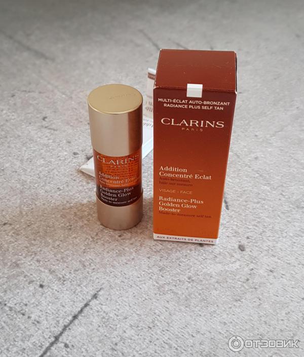 Концентрат с эффектом искусственного загара Clarins Radiance-Plus Golden Glow Booster фото