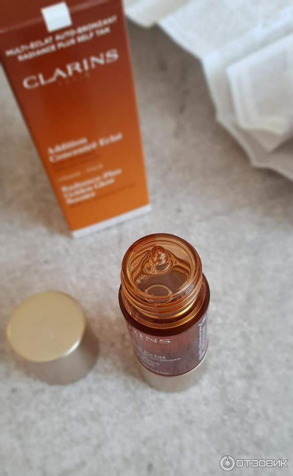 Концентрат с эффектом искусственного загара Clarins Radiance-Plus Golden Glow Booster фото