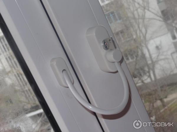 Замок оконный с тросиком для детской безопасности ФурнитураОк фото