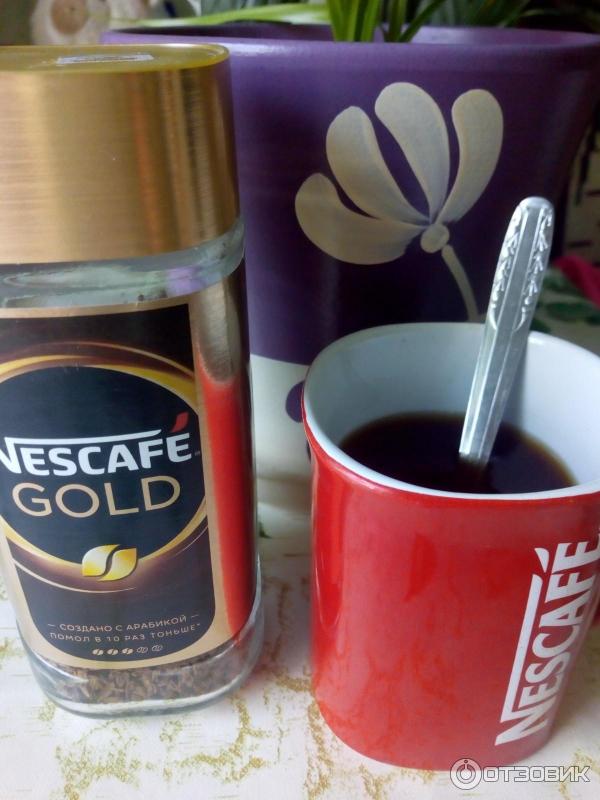 Кофе Nescafe Gold растворимый сублимированный с добавлением натурального жаренного молотого кофе фото